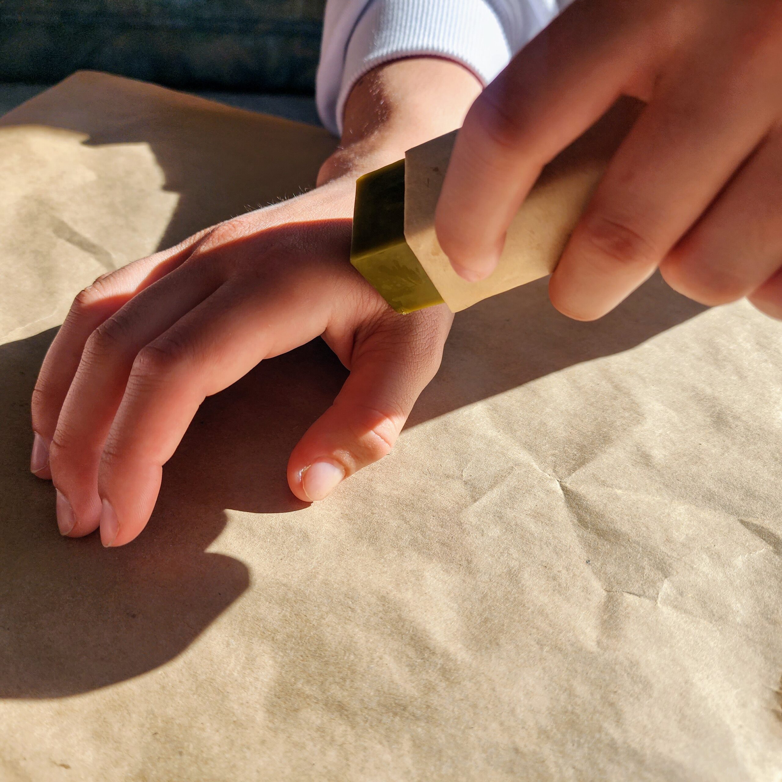 Kawakawa Skincare Sticks For Hands, Legs, Face among other uses. Keep (part of) one for your lips.